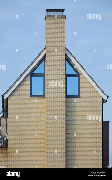 Side Of Modern House With Chimney Stock Photo Alamy