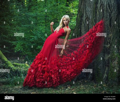 Beautiful Woman Wearing An Amazing Red Dress Stock Photo Alamy