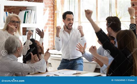 Euphoric Excited Business Team Celebrate Corporate Victory Together In