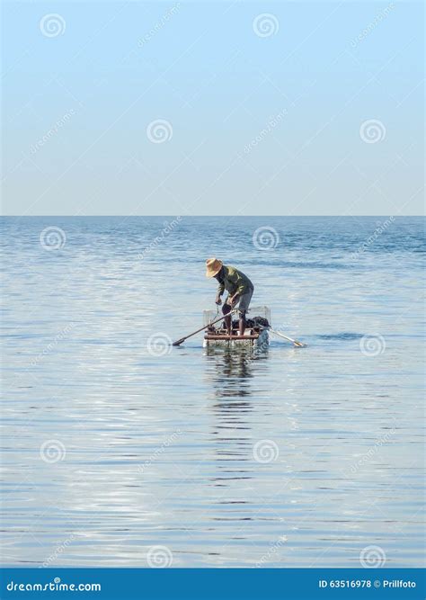Fisherman On The Sea Editorial Stock Photo Image Of Single 63516978