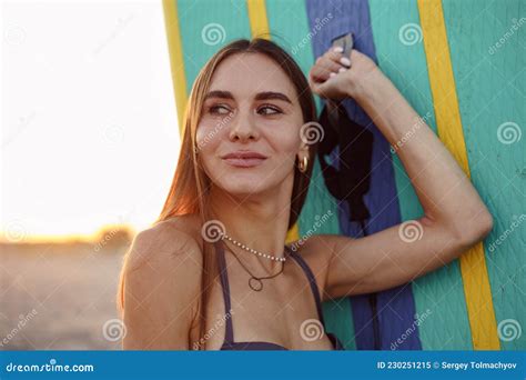 Attractive Young Woman In Swimsuit Posing With Stand Up Paddle Board Stock Image Image Of