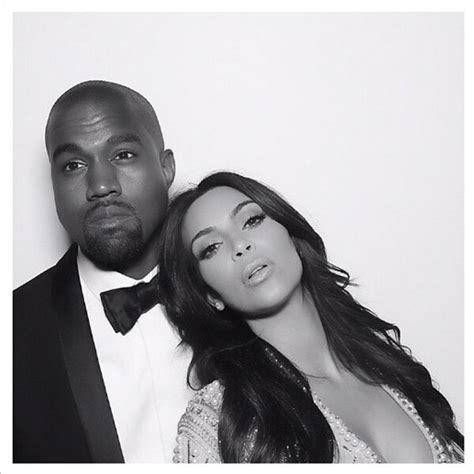 kim kardashian gives kanye west tongue kiss in wedding photo posted on 1st anniversary—see more