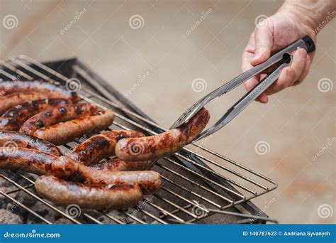 Grilling Sausages On Barbecue Grill Outdoor Stock Image Image Of Lawn Barbecuing 140787623