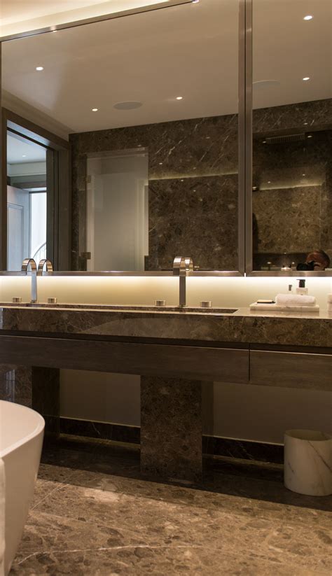 Check spelling or type a new query. Marble-clad glamorous bathroom with bronze PVD stainless ...
