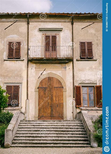 Facade Of An Old Villa In Italy In Florence Stone Stairs Wooden Door