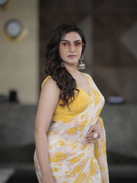 Malayalam Actress Honey Rose Lights Up In A Yellow Floral Saree