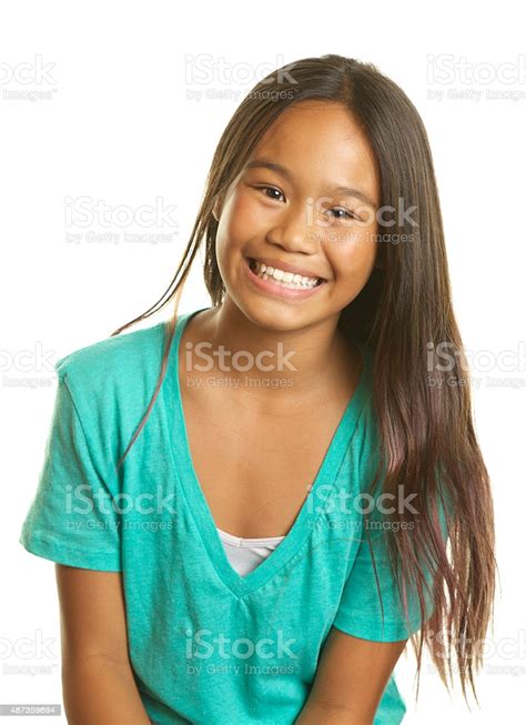 Beautiful Filipino Girl On A White Background Smiling Stock Photo