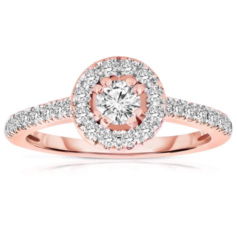 Classy solitaire diamond engagement ring with a sparkly round half carat diamond in 18k solid gold. Half Carat Round cut Halo Diamond Engagement Ring in Rose ...