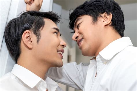 Premium Photo Asian Homosexual Couple In Love Looking Into Each Others Eyes