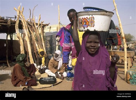 Young Girl Carrying Basin On Her Headagadeznigerwestern Africa Stock