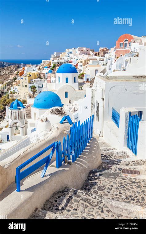 White Houses And Blue Domes In The Village Of Oia Santorini Thira