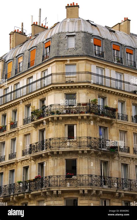 Old Apartment Buildings With Wrought Iron Balconies In Paris France