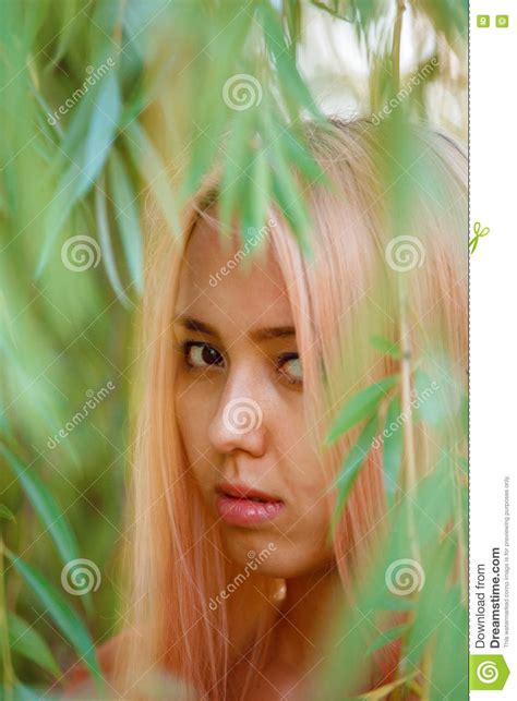 The Girl With Pink Hair Walks In The Park Stock Photo Image Of Face
