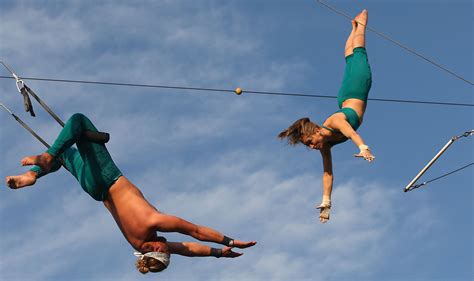 A Flying Trapeze Artist Starts Her Swing From Rest Letter G Decoration