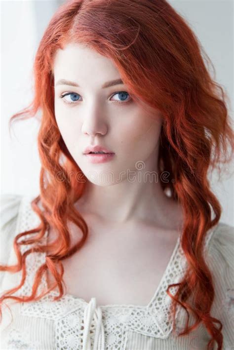 Tender Retro Portrait Of A Young Beautiful Dreamy Redhead Woman Stock
