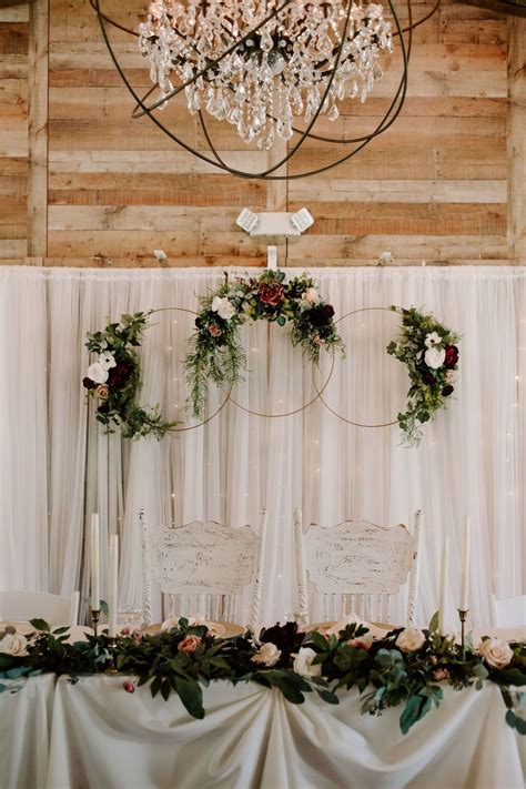 Romantic And Elegant Wedding Head Table With Garlands Of Gorgeous Greenery And Ri Head Table