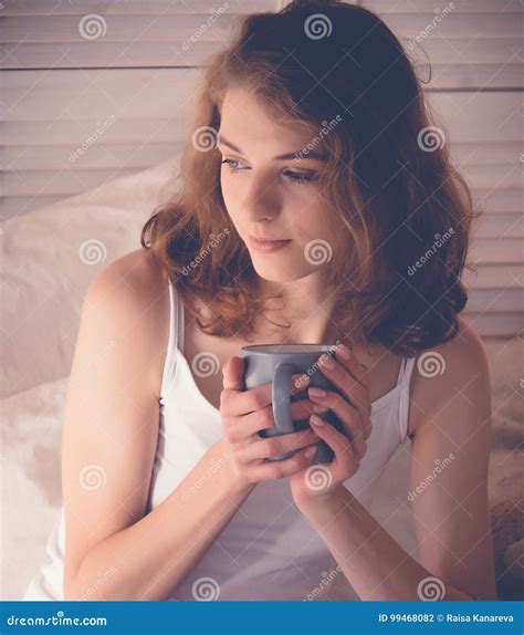 Beautiful Woman Drinking A Coffee In Her Bed Lifestyle Concept Stock