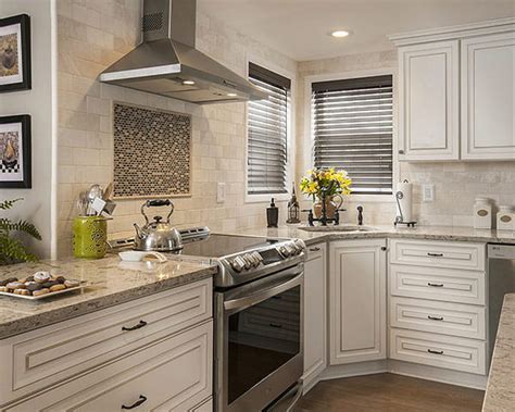 Adorable waterfall quartz countertop for a kitchen island looks traditional cabinetry with beige subway tiles and matching quartz counters. What Countertop Color Looks Best with White Cabinets?