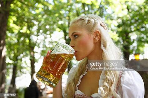 Woman Holding Beer Mug Photos And Premium High Res Pictures Getty Images