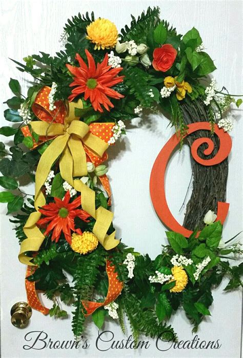 We are constantly adding spring door wreaths for the front door that will bring a little. Orange and Yellow Spring Grapevine Wreath | Spring wreath ...
