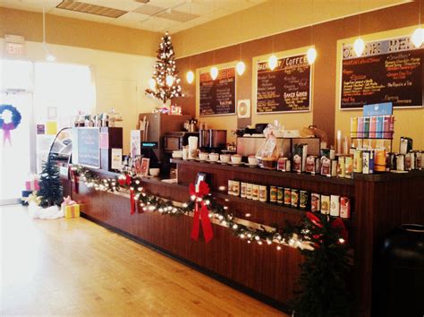 The Neighborhood Cafe Is Decorated For The Christmas Season Stop In To