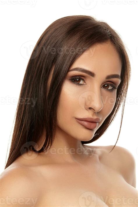 Close Up Portrait Of A Brunette Nude Model Girl With Professional Evening Make Up And Plump Lips