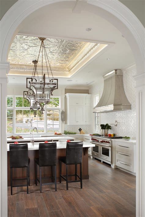 We ensure that the tin kitchen ceiling installation suits the theme of your home. White Transitional Kitchen With Stunning Tin Tile Ceiling ...