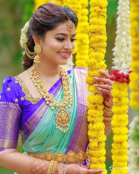Sneha Prasannas Exquisite Look In A Turquoise Kanchipuram Saree