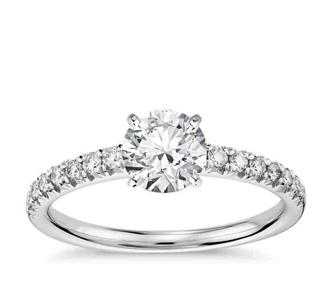 Because of this tradition, the engagement ring is taken off during the ceremony, so that the wedding ring can be worn beneath it. Pave Engagement Rings: An Infinity of Diamonds - Wedding and Bridal Inspiration