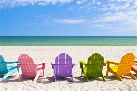 Affordable and search from millions of royalty free images, photos and vectors. Adirondack Beach Chairs on a Sun Beach in Front of a ...