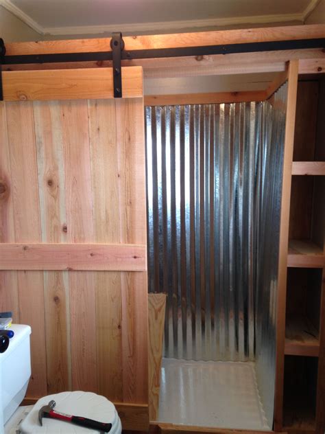 Corrugated Metal Shower With Sliding Cedar Barn Door W Cubby Shelves
