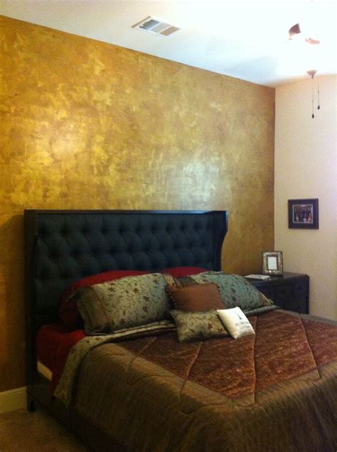 This Elegant Bedroom Features A Metallic Copper And Gold Accent Wall