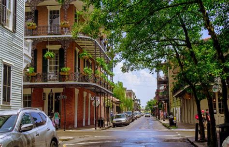 Picturesque French Quarter And Pedestrians On The Street Tour Of The