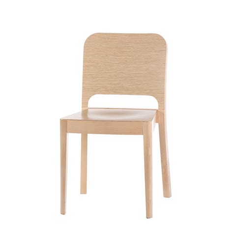 The solid wood dining chair with cushion adds a natural charm in furniture decor. 911 Contemporary Wood Chair | The Chair Market