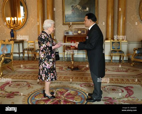 Queen Elizabeth Ii Receives The Ambassador From The Lao Peoples