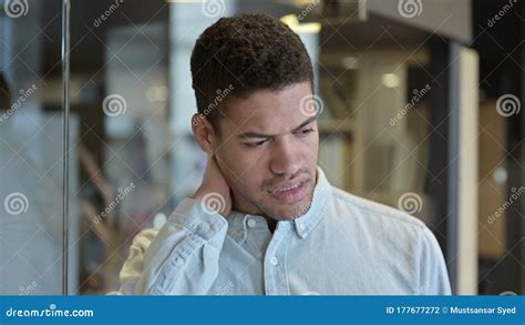 The Tired Young African Man Having Neck Pain Stock Photo Image Of