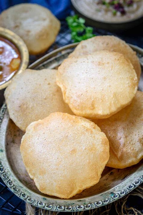 Poori Puri Is An Indian Fried Puffed Bread That Is Made Using Whole