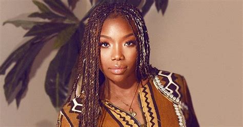 brandy norwood of moesha fame looks youthful as she shows off her natural look and long braids