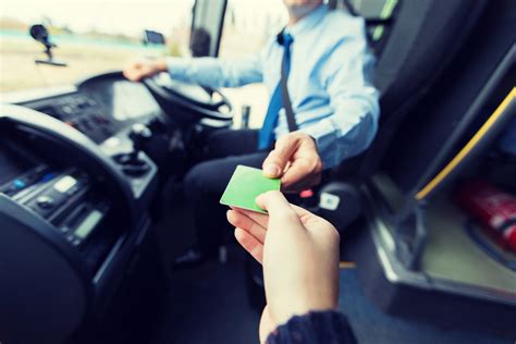 Bus Driver Taking Ticket Or Card From Passenger Landau Forte Academy Qems