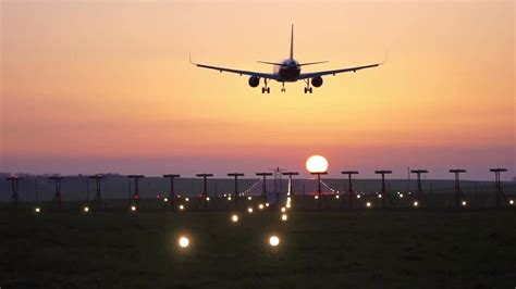 Airplane Landing At Sunset Stock Video Motion Array