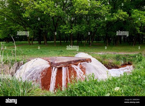 The discharge of wastewater into the river. Industrial wastewater flow