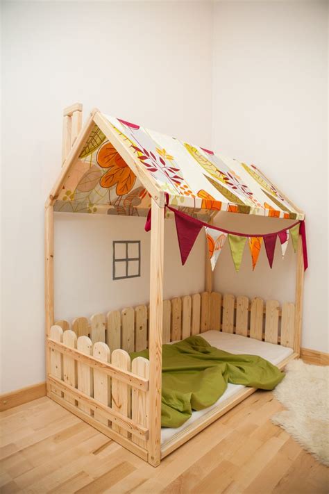 Ideally, transitioning your toddler from a crib to a bed should happen between 18 months and four years of age (1). House shaped bed, Montessori bed Wood frame house bed ...