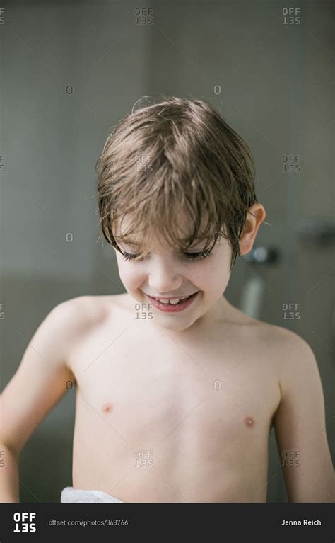 Young Child Drying Off With A Towel Stock Photo Offset