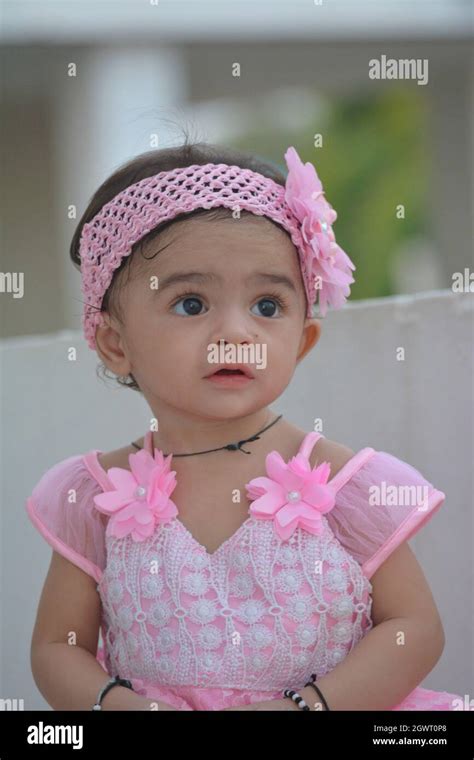 Portrait Of Cute Girl Looking Away Stock Photo Alamy