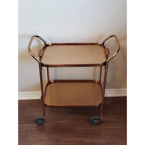 We have everything to make you the ideal host! Mid-Century Modern Tray Top Rolling Bar Cart by Kaymet ...