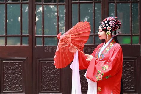 Chinese Opera Womanpracticing Peking Opera In The Garden Colorful