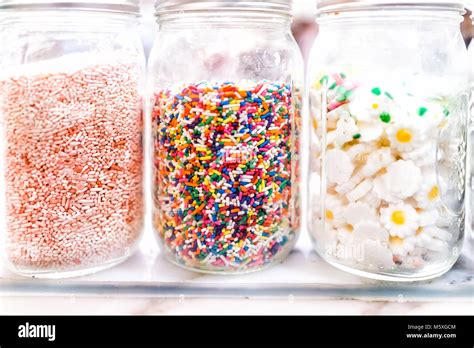 Closeup Of Jars Of Sweet Colorful Sprinkles And Toppings Decorations