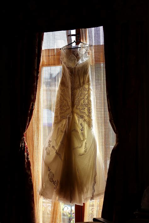 free picture wedding dress hanging window backlight covering clothing statue style