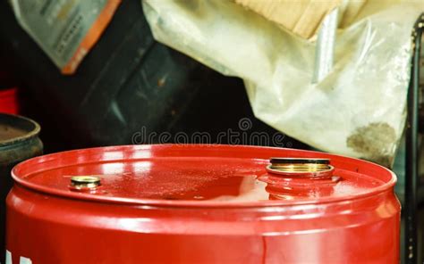 Red Oil Barrels In Mechanic Garage Car Service Or Shop Stock Image