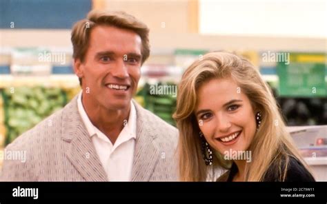 usa kelly preston and arnold schwarzenegger in a scene from the ©universal pictures movie